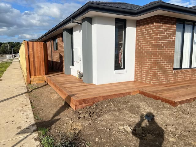 Small hardwood entry deck at a new build