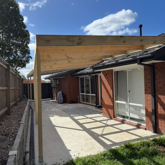 Timber pergola frame part way through construction